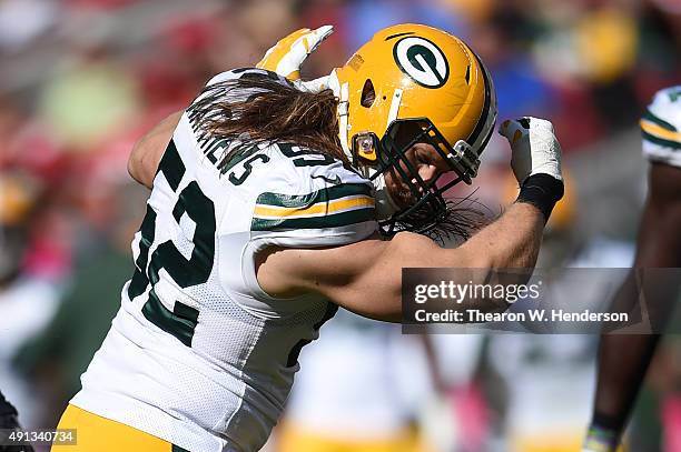Inside linebacker Clay Matthews of the Green Bay Packers reacts after sacking quarterback Colin Kaepernick of the San Francisco 49ers during their...