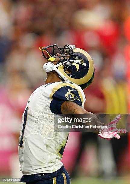 Wide receiver Tavon Austin of the St. Louis Rams celebrates his fourth-quarter touchdown during the NFL game against the Arizona Cardinals at the...