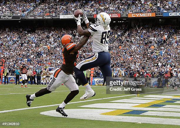 Ladarius Green of the San Diego Chargers catches a pass for a touchdown over Donte Whitner of the Cleveland Browns in the third quarter at Qualcomm...
