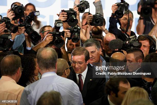 Portuguese Prime Minister and Social Democratic Party's leader Pedro Passos Coelho meets his wife Laura Ferreira after winning the general elections...