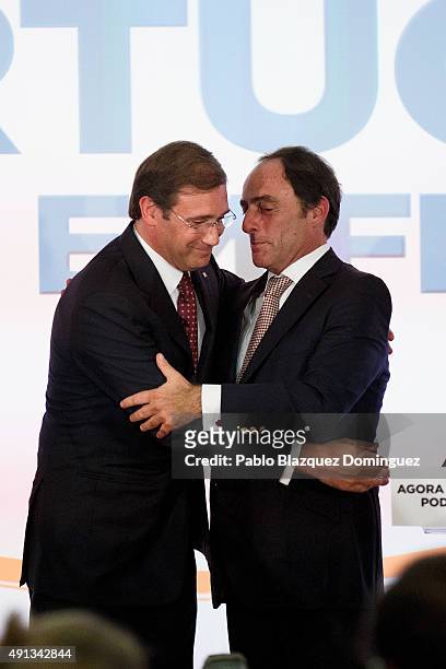 Portuguese Prime Minister and Social Democratic Party's leader Pedro Passos Coelho and Portuguese deputy prime minister Paulo Portas celebrate...