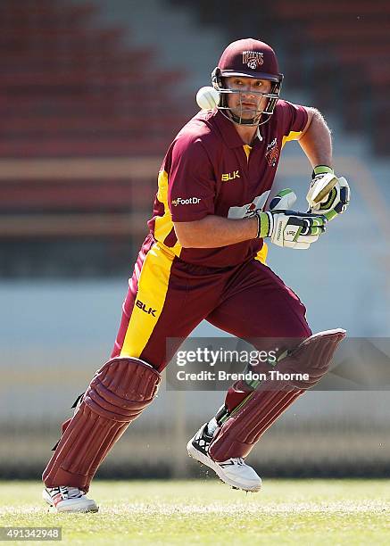 Peter Forrest of Qld plays a stroke on the off side during the Matador BBQs One Day Cup match between Queensland and Tasmania at North Sydney Oval on...