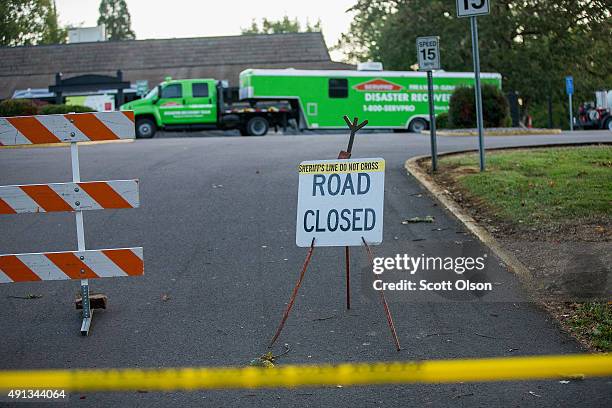 Crime scene tape still surrounds the campus of Umpqua Community College where a hazardous material cleaning crew continues to work inside Snyder Hall...