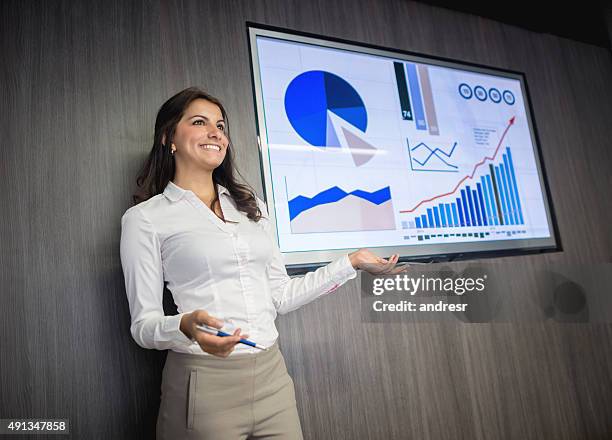 business woman making a presentation - data management stock pictures, royalty-free photos & images