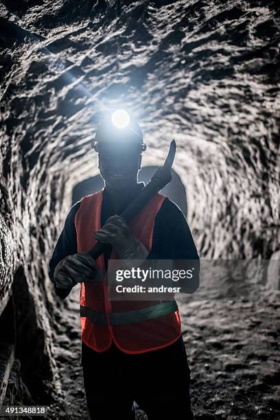 miner working at a mine underground - miner helmet portrait stock pictures, royalty-free photos & images