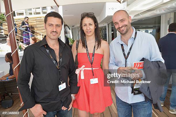 Jalil Naciri, Leila Hachachnia and Pascal Tessaud attend Deadline's Cocktails on the Croisette in partnership with AmericanExpress and Film...