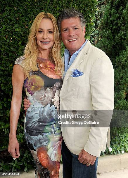 Personality Taylor Armstrong and husband John Bluher arrive at The Rape Foundation's Annual Brunch at Greenacres, The Private Estate of Ron Burkle on...