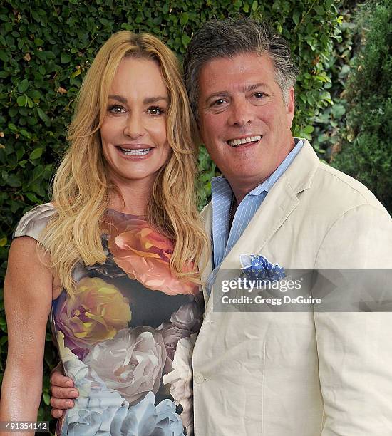 Personality Taylor Armstrong and husband John Bluher arrive at The Rape Foundation's Annual Brunch at Greenacres, The Private Estate of Ron Burkle on...