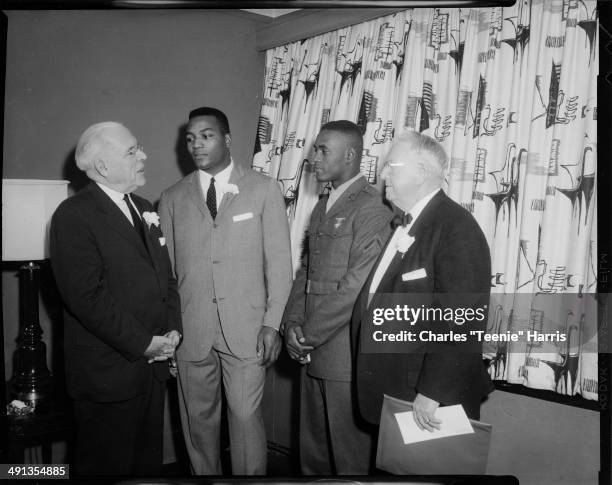 Pennsylvania Governor David L Lawrence, Cleveland Browns football player Jim Brown, Pittsburgh Pirates baseball player Roberto Clemente, and...