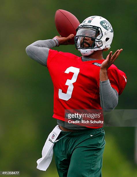 Quarter Back Tajh Boyd of the New York Jets looks to pass during the first day of rookie minicamp on May 16, 2014 in Florham Park, New Jersey.