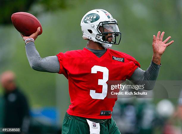 Quarter Back Tajh Boyd of the New York Jets looks to pass during the first day of rookie minicamp on May 16, 2014 in Florham Park, New Jersey.