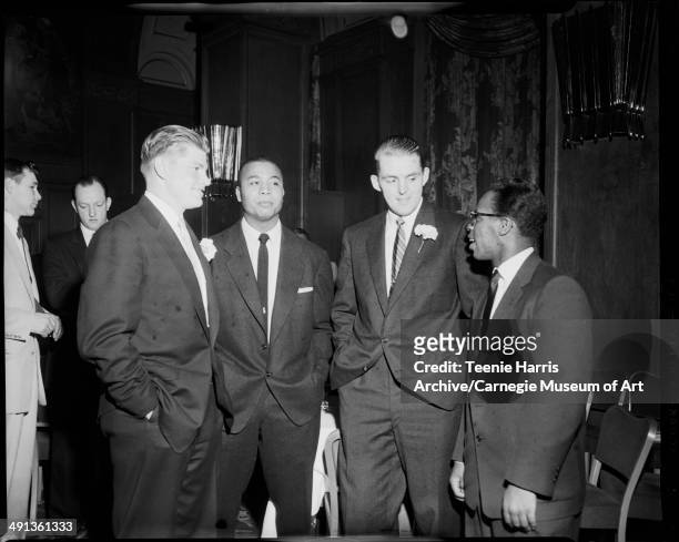 Group portrait of baseball players from left: Bob Turley of New York Yankees, Larry Doby of Cleveland Indians, and Frank Thomas and Curt Roberts of...