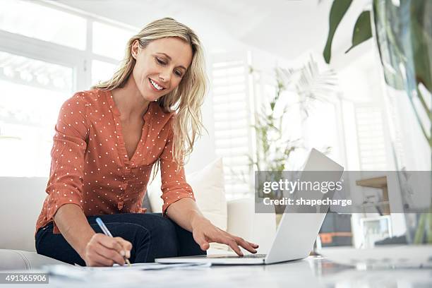 making sure all her bills are paid - content writer stock pictures, royalty-free photos & images