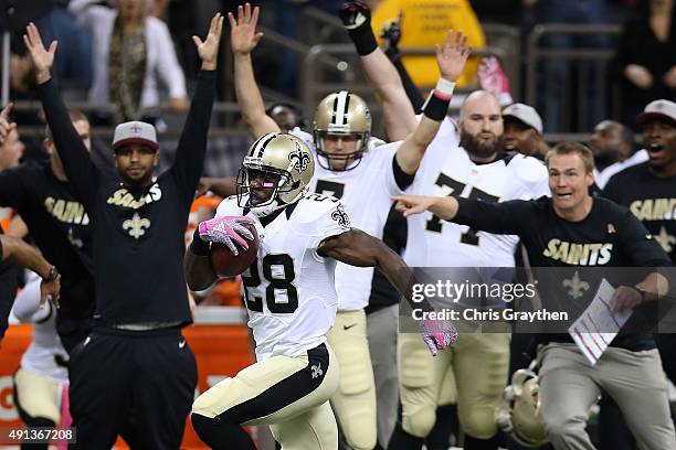 Spiller of the New Orleans Saints runs for a touchdown to defeat the Dallas Cowboys 26-20 in overtime at Mercedes-Benz Superdome on October 4, 2015...