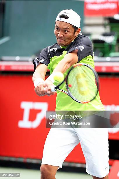 Tatsuma Ito of Japan in action during the men's singles first round match against Yoshihito Nishioka of Japan on day one of Rakuten Open 2015 at...