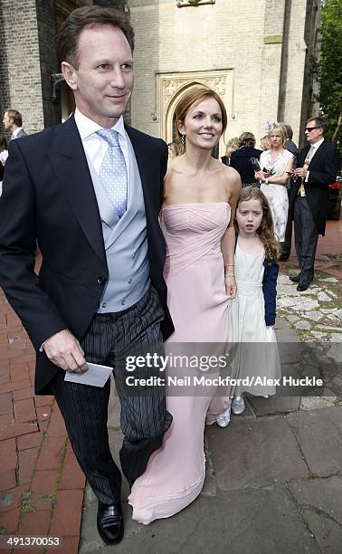Christian Horner, Geri Halliwell and her daughter Bluebell leaving the wedding of Poppy Delevingne and James Cook on May 16, 2014 in London, England.