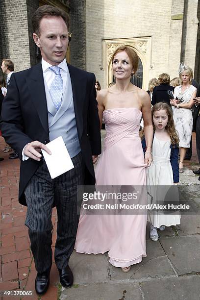 Christian Horner, Geri Halliwell and her daughter Bluebell leaving the wedding of Poppy Delevingne and James Cook on May 16, 2014 in London, England.