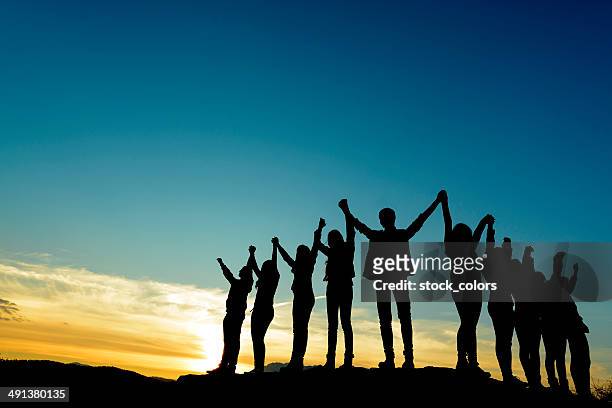 unity - medium group of people stock pictures, royalty-free photos & images
