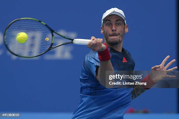 Andreas Haider-Maurer of Austria returns a shot against Jo-Wilfried Tsonga of France during the Men's singles first round match on day three of the...