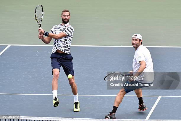 Benoit Paire of France and Santiago Gonzales of Mexico compete against Fernando Verdasco of Spain and Richard Gasquet of France during the men's...