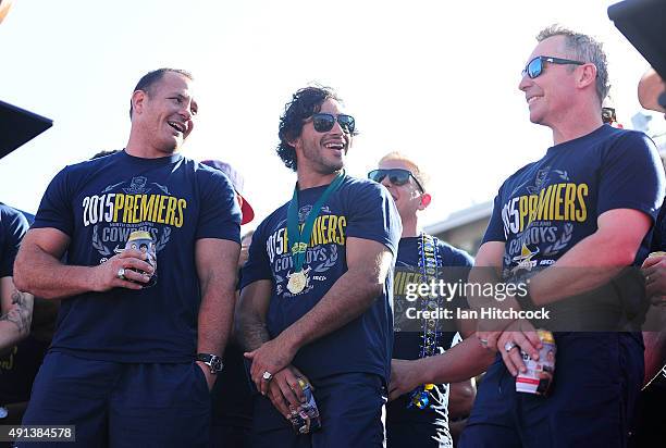 Johnathan Thurston, Matthew Scott and Paul Green of the Cowboys share a laugh with the crowd whilst standing on stage during the North Queensland...