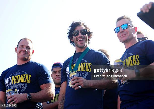 Johnathan Thurston, Matthew Scott and Paul Green of the Cowboys share a laugh with the crowd whilst standing on stage during the North Queensland...