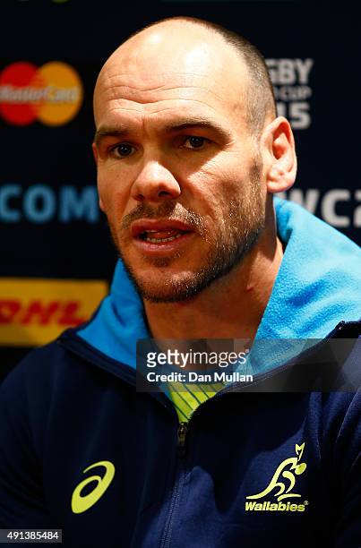 Nathan Grey, Defence Coach of Australia speaks to the media during an Australia media session at the Grange Wellington Hotel on October 5, 2015 in...