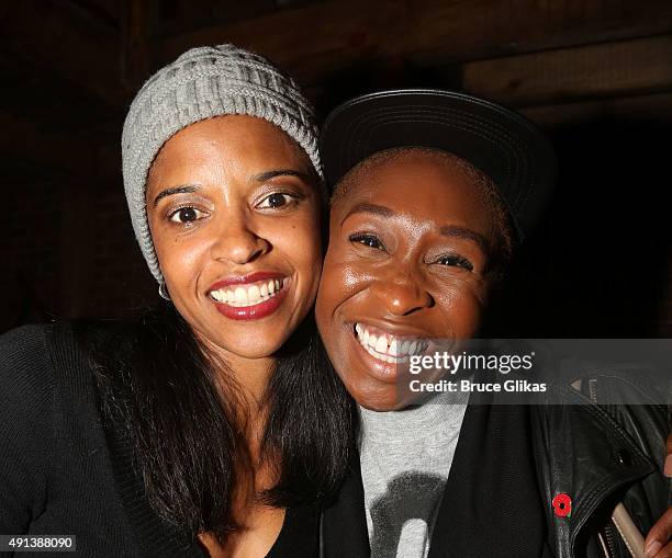 Renee Elise Goldsberry and Cynthia Erivo pose backstage at the hit musical "Hamilton" on Broadway at The Richard Rogers Theater on October 4, 2015 in...