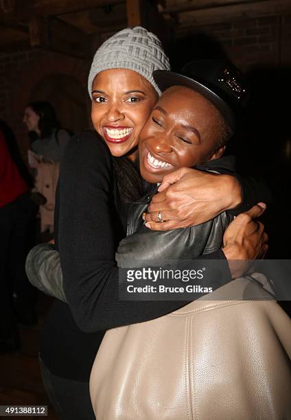 Renee Elise Goldsberry and Cynthia Erivo pose backstage at the hit musical "Hamilton" on Broadway at The Richard Rogers Theater on October 4, 2015 in...