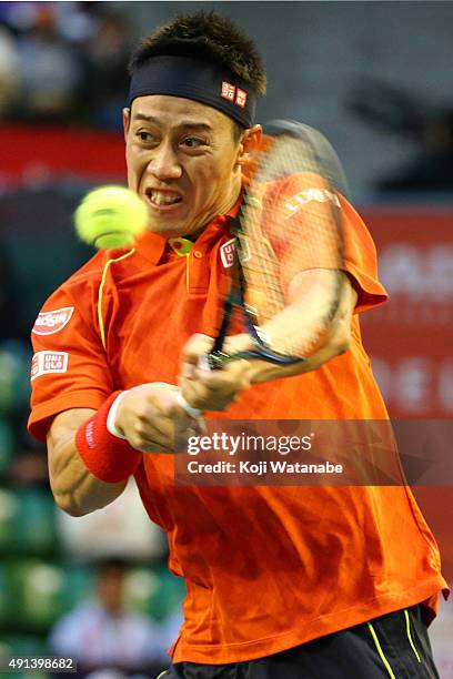 Kei Nishikori of Japan competes against Borna Coric of Croatia during the men's singles first round match on day one of Rakuten Open 2015 at Ariake...