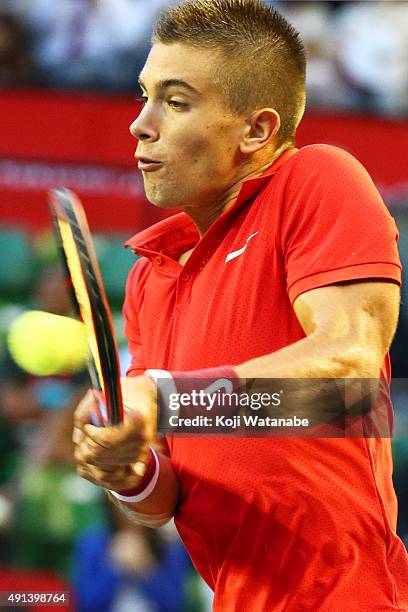 Borna Coric of Croatia competes against Kei Nishikori of Japan during the men's singles first round match on day one of Rakuten Open 2015 at Ariake...