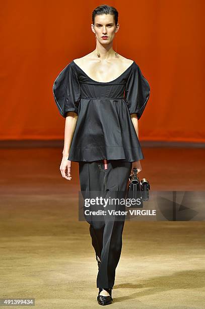 Model walks the runway during the Celine Ready to Wear show as part of the Paris Fashion Week Womenswear Spring/Summer 2016 on October 4, 2015 in...