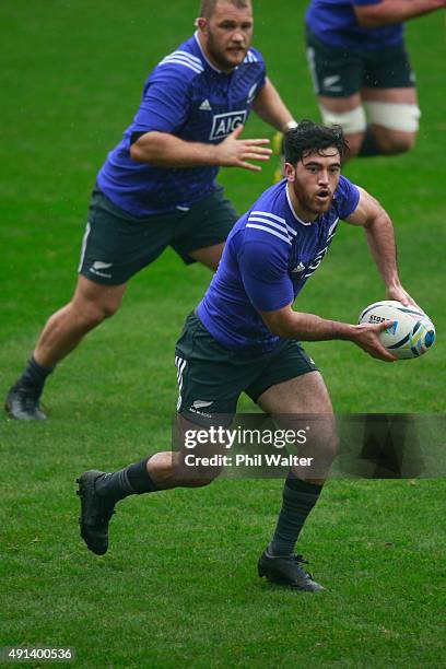 Nehe Milner-Skudder of the All Blacks passes during a New Zealand All Blacks training session at Mowden Park on October 5, 2015 in Darlington, United...