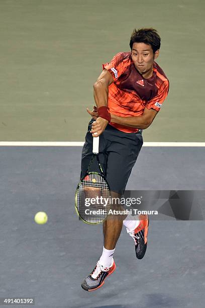 Yasutaka Uchiyama of Japan competes against Jiri Vesely of Czech Republic during the men's singles first round match on day one of Rakuten Open 2015...