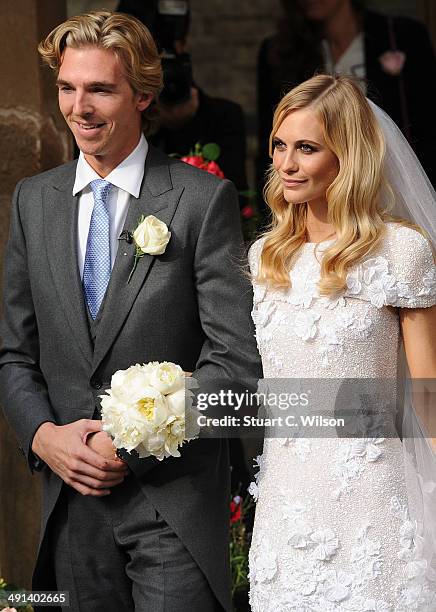 James Cook and Poppy Delevingne depart St. Pauls Church in Knighstbridge after thier wedding on May 16, 2014 in London, England.