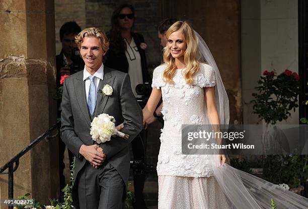 James Cook and Poppy Delevingne depart St. Pauls Church in Knighstbridge after thier wedding on May 16, 2014 in London, England.