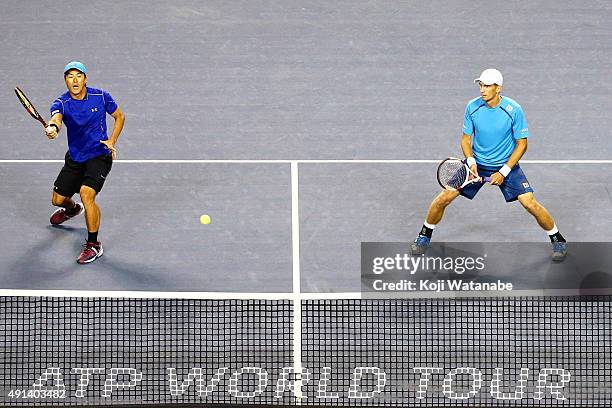 Toshihide Matsui of Japan and Jarkko Nieminen of Finland compete against Aisam-Ul-Haq Qureshi of Pakistan and Gilles Simon of France during the men's...