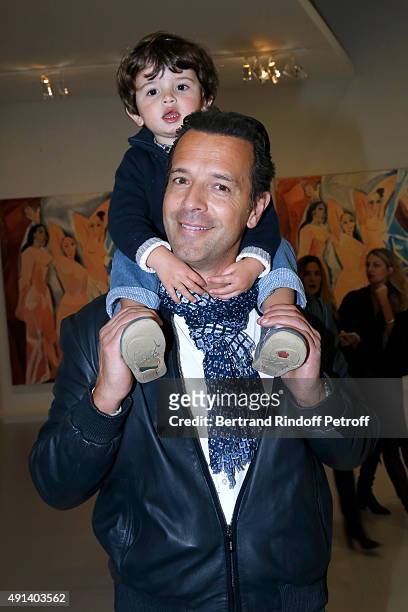 Host Olivier Carreras with his daughter attend the 'Picasso Mania' : Press Preview. Held at Grand Palais on October 4, 2015 in Paris, France.