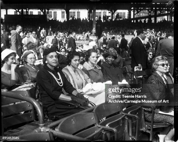Mildred Baker, Ella Baker, Kay Jones, and Carrie Stevens in stands at opening baseball game of 1960 World Series, Forbes Field, Pittsburgh,...