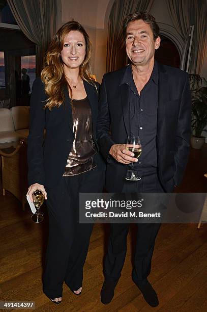 Amy Gadney and Tim Bevan attend the annual Charles Finch Filmmakers Dinner during the 67th Cannes Film Festival at Hotel du Cap-Eden-Roc on May 16,...
