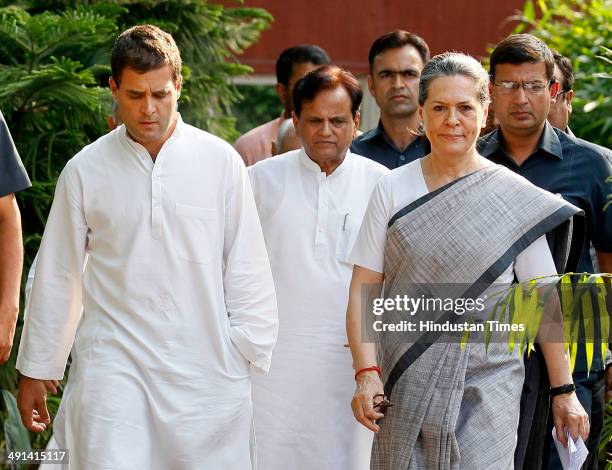 Congress President Sonia Gandhi and Vice - President Rahul Gandhi arrive to address the media after the results at AICC headquarter on May 16, 2014...