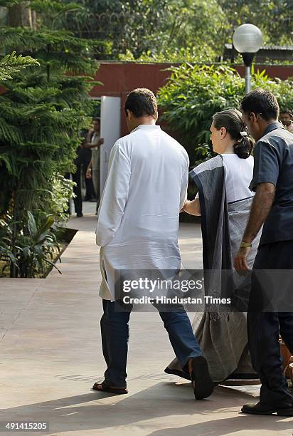 Congress President Sonia Gandhi and Vice - President Rahul Gandhi leaves after addressing the media after the results at AICC headquarter on May 16,...