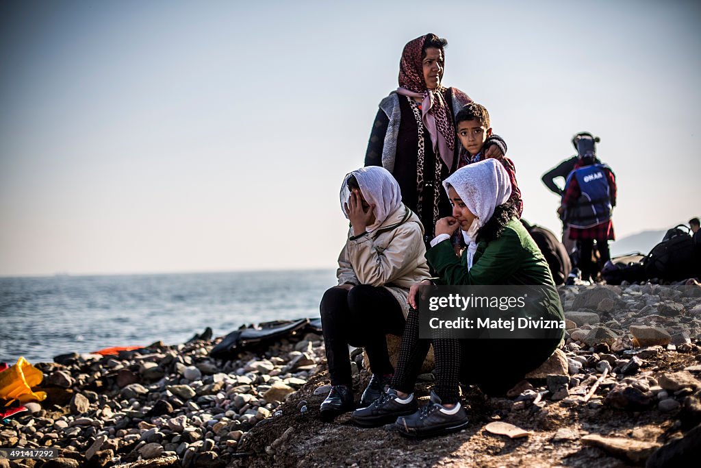 Migrants Arrive On The Beaches Of Lesbos Having Made The Crossing From Turkey