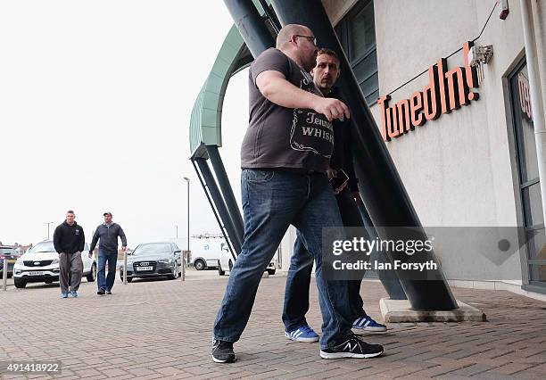 Steelworkers arrive ahead of a meeting with Shadow Chancellor John McDonnell who met with workers, their families, trade union officials and local...