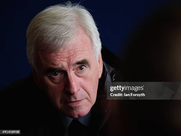 Shadow Chancellor John McDonnell meets with steelworkers and their families, trade union officials and local MPs at the Tuned In Centre on October 5,...