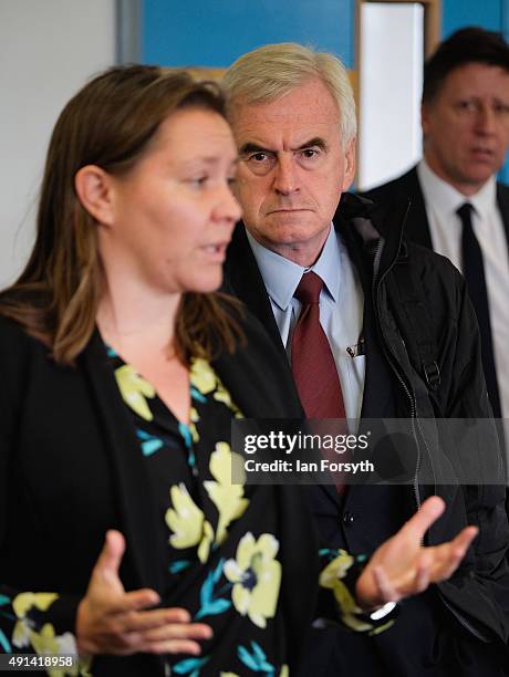 Shadow Chancellor John McDonnell looks on as Labour MP for Redcar Anna Turley speaks to steelworkers and their families, trade union officials and...