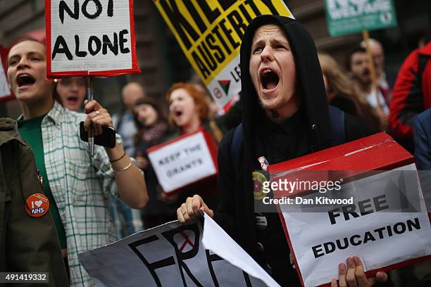 Anti-austerity protesters gather outside Manchester Central during on the second day of the Conservative party conference on October 5, 2015 in...