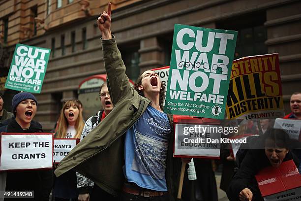 Anti-austerity protesters gather outside Manchester Central during on the second day of the Conservative party conference on October 5, 2015 in...