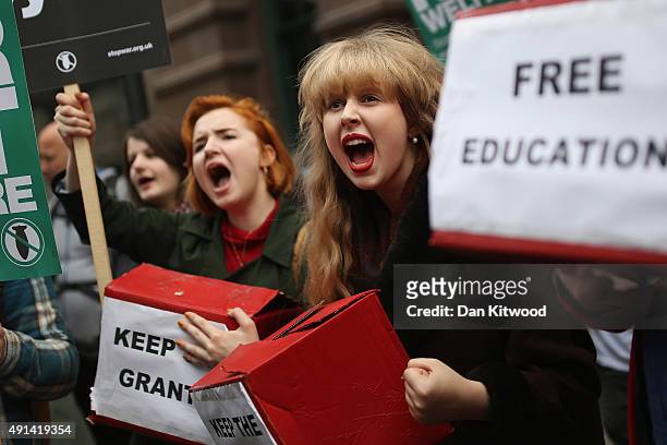 Anti-austerity protesters gather outside Manchester Central during on the second day of the Conservative party conference on October 5, 2015 in...