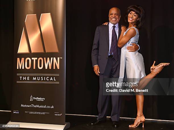 Berry Gordy and cast member Lucy St Louis attend the "Motown The Musical" photocall at The Hospital Club on October 5, 2015 in London, England.